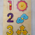 Wooden number peg puzzle used