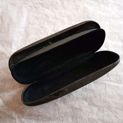 Glasses cases used, black and brown