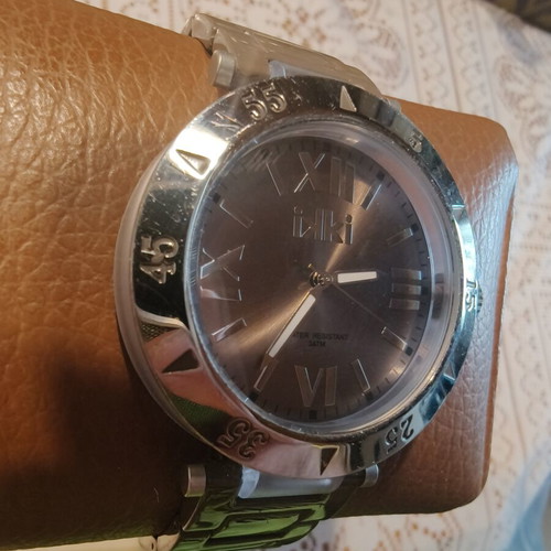 IKI Men's Quartz Watch with Brown Dial and Roman Numerals