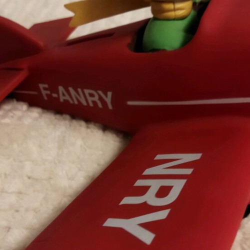Le Petit Prince figure decorative like new with red airplane