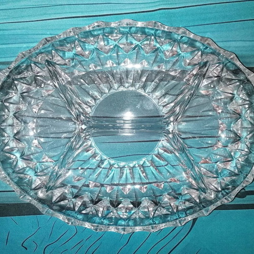 Oval glass platter for nuts used with small chip