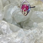 Silver ring with natural ruby and moissanite