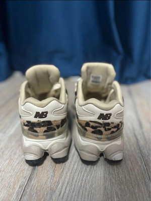 New Balance women's shoes with leopard print design
