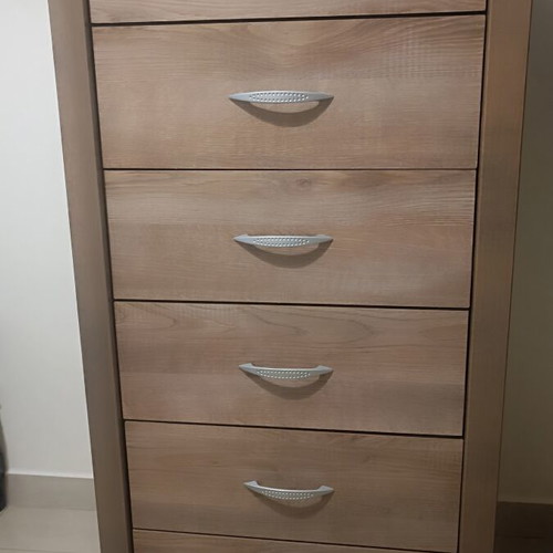 Wooden bedroom set with semi-double bed, nightstand, and chest of drawers