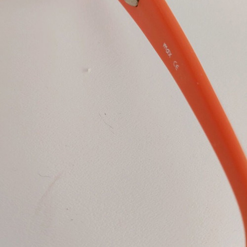 Myopia glasses frame used with embossed side surface
