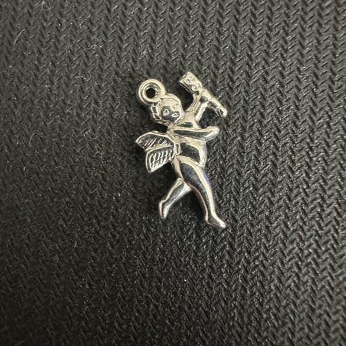 Metal silver Cupid charm like new for jewelry and crafts
