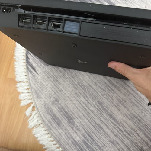 PlayStation 4 Slim 1TB console used with original Sony controller