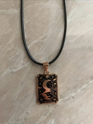 The Moon Tarot necklace like new, black and gold