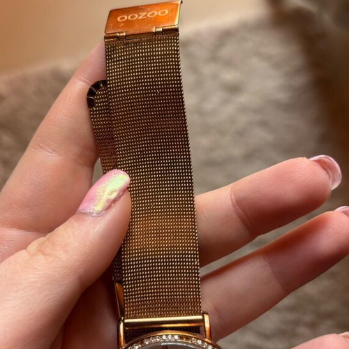 Oozoo gold watch like new, few missing rhinestones