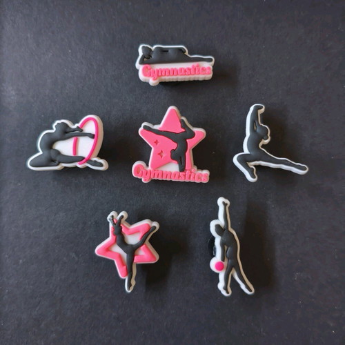 Crocs Charms Gymnastics Love set like new, pink multicolor