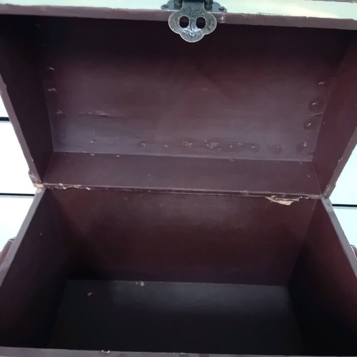 Small trunk used with ship decor and leather handles