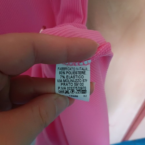 Pink mini dress like new, small size, short sleeves with slit and decorative buttons