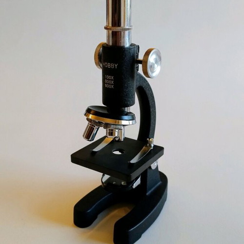 Hobby educational microscope used with 3 lenses and lighting