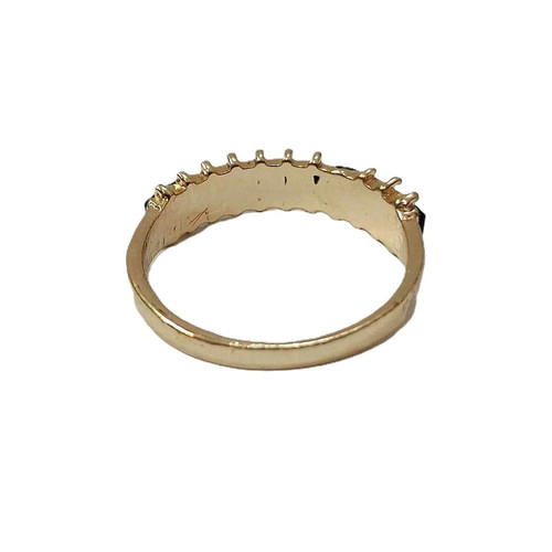 Eternity ring like new, gold color with black stones