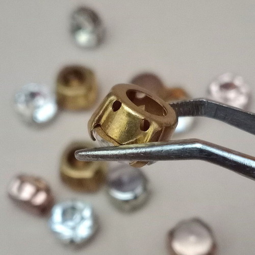 Glass rhinestones on metal base like new for sewing
