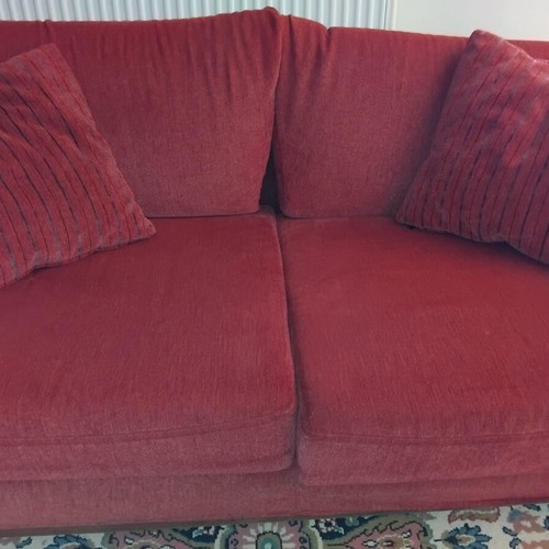 Two-seater sofa used with set of 2 cushions