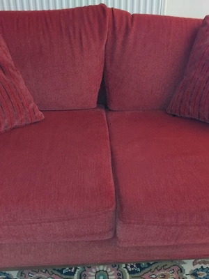 Two-seater sofa used with set of 2 cushions
