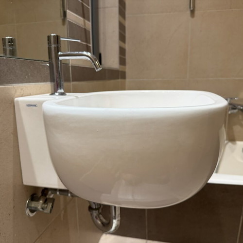 Bathroom sanitary items used, Ideal Standard toilet, sink and faucets