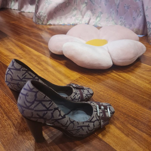 Calvin Klein burgundy high heels used with unique design
