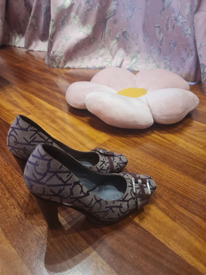 Calvin Klein burgundy high heels used with unique design