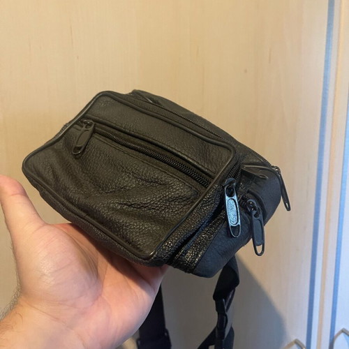 Black waist bag like new with minor zipper defect