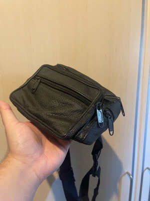 Black waist bag like new with minor zipper defect