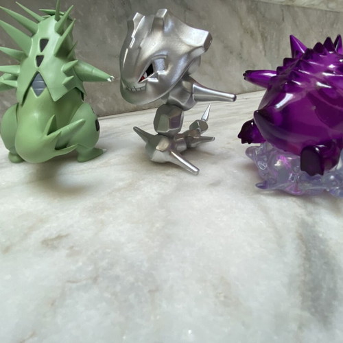 Pokemon figures pack used with Tyranitar, Gengar, Steelix