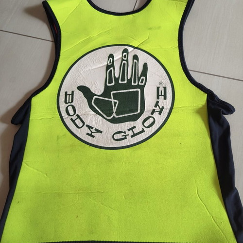Neoprene vest used by Body Glove for water sports protection