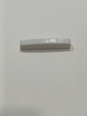 Plastic nut for electric and acoustic guitar, 44mm, white