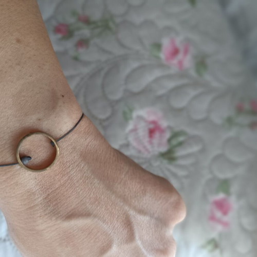 Bracelet with adjustable cord, like new, gray and gold
