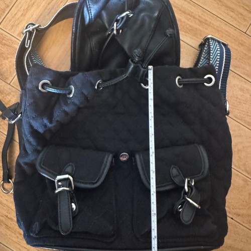 Migato backpack like new, black quilted with blue straps