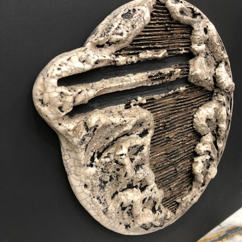 Wall ceramic sculpture used, moon on black wooden panel