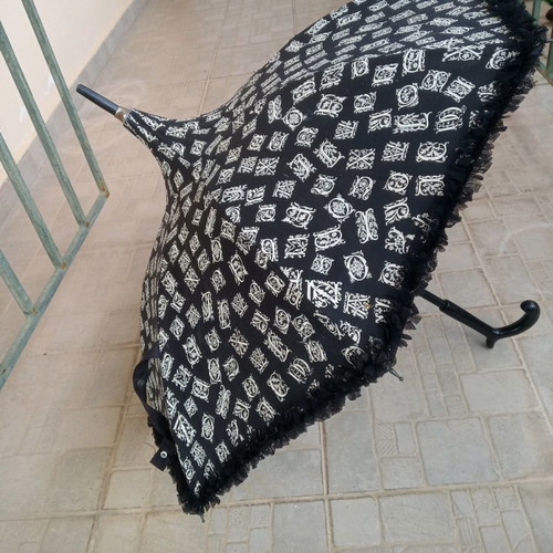 Chantai Thomass umbrella used with frills from France