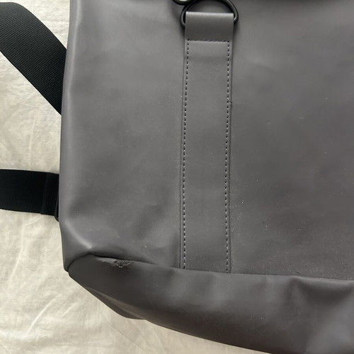 Rains backpack men's used with front wear, gray