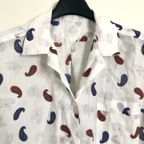 Vintage women's short-sleeve shirt with paisley pattern used, size M