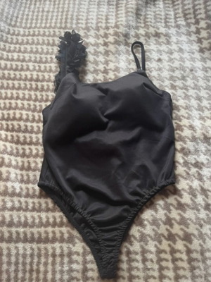 Bodysuit like new, black, without fasteners with padding