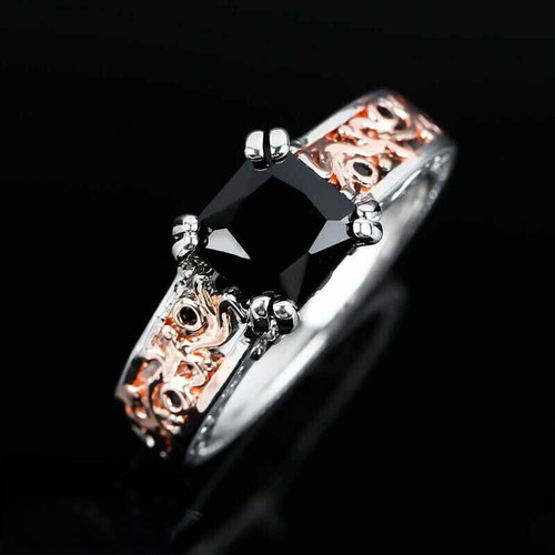 Ring with black zircon new, silver and rose gold