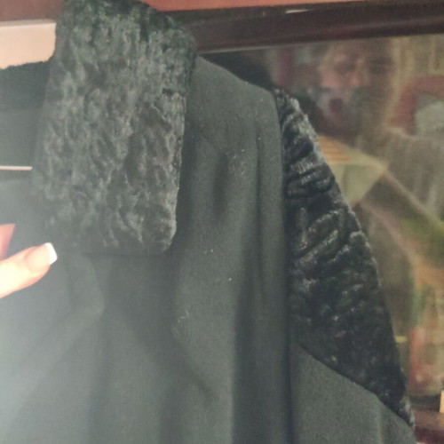 Black coat like new with details, fits up to XL