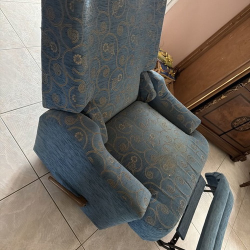 Recliner armchair with footrest