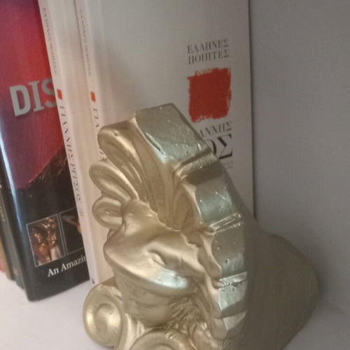 Acroceram with Hermes head like new, gold color