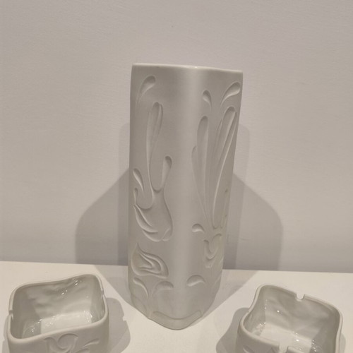 White ceramic vase with two square ashtrays, embossed design