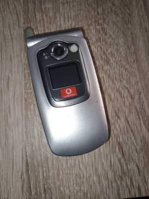 Sharp GX20 cell phone used, no charger, battery may need replacement