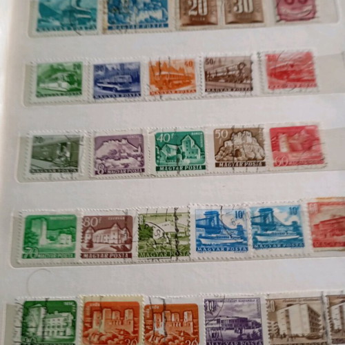 Two stamp albums with stamps from around the world
