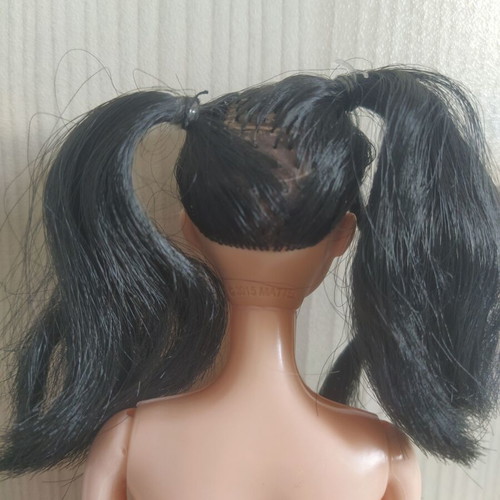 Barbie doll Asian with facesculpt Olivia and articulated body