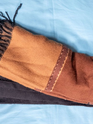 Wide unisex scarf used, colors ecru, brown and black