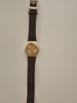 Swatch women's wristwatch with brown suede strap and gold case like new