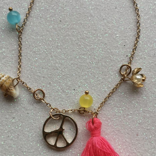 Bracelet like new with details and tassel