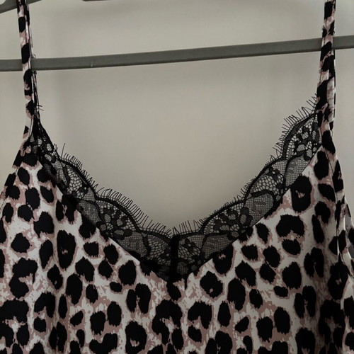 Women's leopard print top like new with black lace