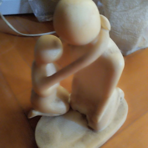 Figurine used, woman detached but held on man's neck, 21 cm