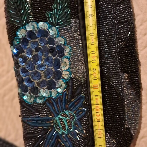Accessorize evening bag like new with full embroidery